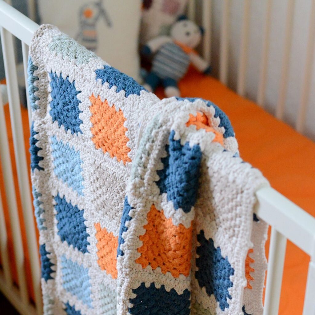 Organic baby blanket (petrol blue) by Pebble Toys on the Rosette Network