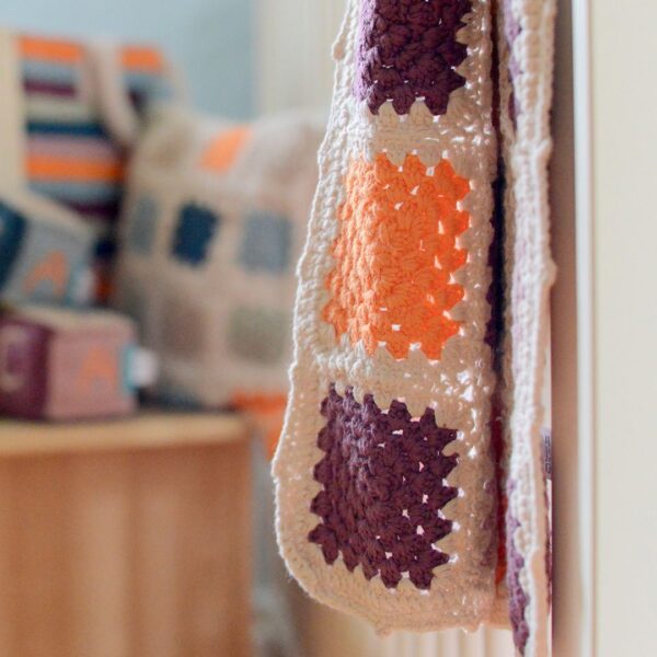 Organic baby blanket (purple) by Pebble Toys on Rosette Fair Trade