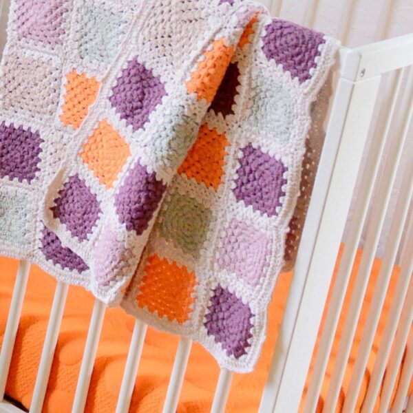 Organic baby blanket (purple) by Pebble Toys on the Rosette Network