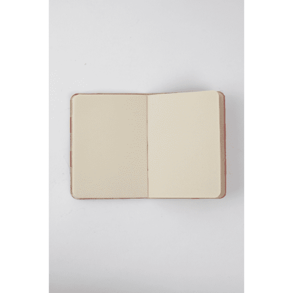 Groovy embossed journal (fair trade) by Ten Thousand Villages on Rosette Fair Trade