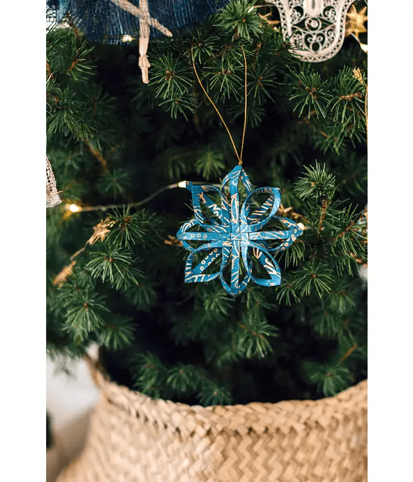 Touch of Gold Star Ornament (blue, lifestyle) by Ten Thousand Villages on Rosette Fair Trade